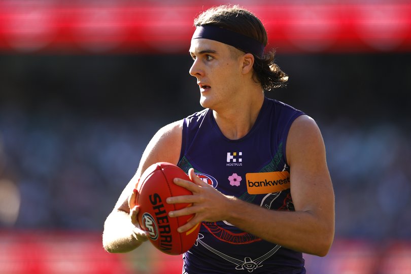 SYDNEY, AUSTRALIA - JULY 06: Murphy Reid of the Dockers looks to pass the ball during the round 17 AFL match between Sydney Swans and Fremantle Dockers at Sydney Cricket Ground on July 06, 2025 in Sydney, Australia. (Photo by Darrian Traynor/Getty Images via AFL Photos)