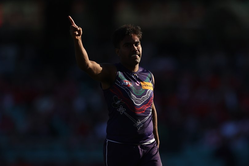 SYDNEY, AUSTRALIA - JULY 06: Isaiah Dudley of the Dockers celebrates kicking a goal during the round 17 AFL match between Sydney Swans and Fremantle Dockers at Sydney Cricket Ground on July 06, 2025 in Sydney, Australia. (Photo by Mark Metcalfe/AFL Photos)