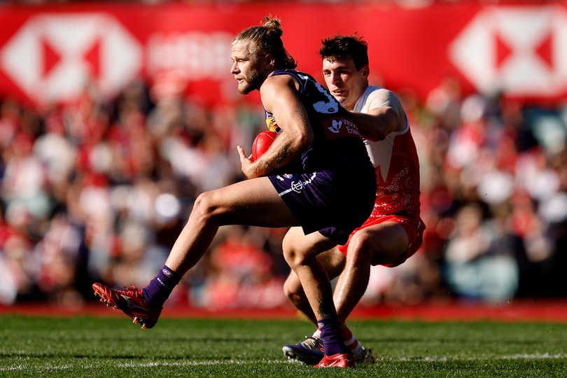 SYDNEY, AUSTRALIA - JULY 06: Corey Wagner of the Dockers competes with Errol Gulden of the Swans during the round 17 AFL match between Sydney Swans and Fremantle Dockers at Sydney Cricket Ground on July 06, 2025 in Sydney, Australia. (Photo by Brendon Thorne/AFL Photos/Getty Images via AFL Photos)