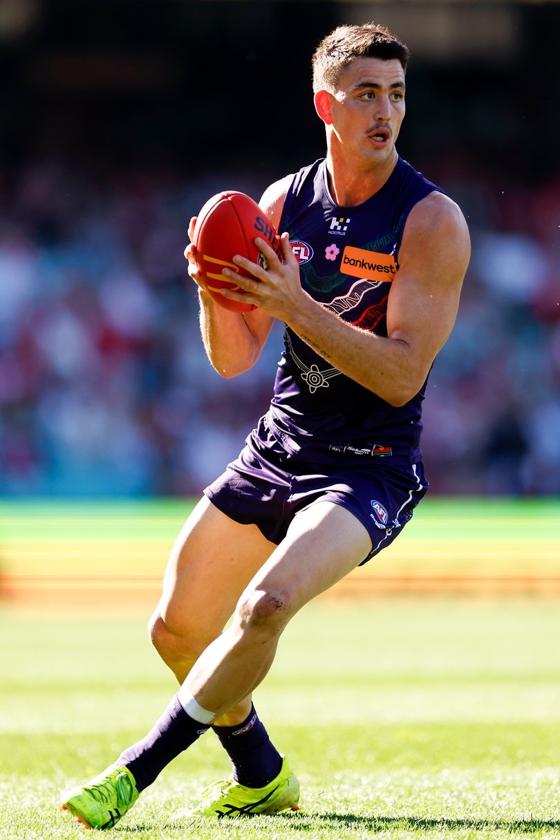 SYDNEY, AUSTRALIA - JULY 06: Patrick Voss of the Dockers controls the ball during the round 17 AFL match between Sydney Swans and Fremantle Dockers at Sydney Cricket Ground on July 06, 2025 in Sydney, Australia. (Photo by Brendon Thorne/AFL Photos/Getty Images via AFL Photos)