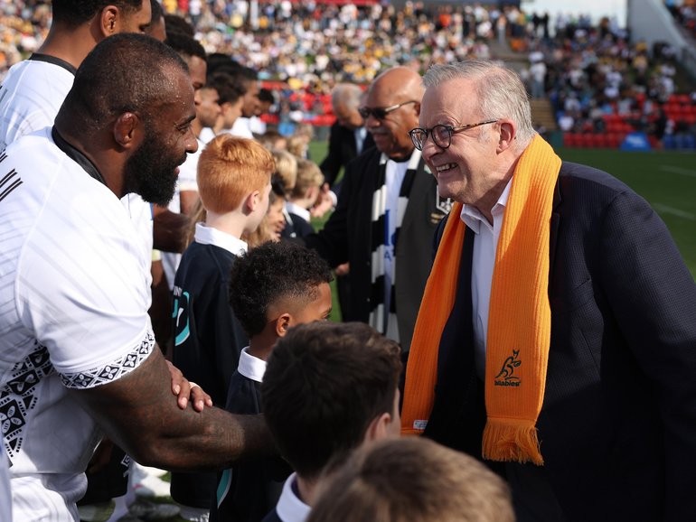 Anthony Albanese, Prime Minister of Australia shakes hands with players ahead of the International Test match between Australia Wallabies and Fiji in Newcastle. (Photo by Matt King/Getty Images) 