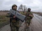 Russian and Ukrainian soldiers both say they have attempted to down drones from their opponents. (AP PHOTO)