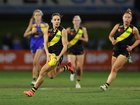 Stars such as Richmond’s Monique Conti are attracting girls to footy.