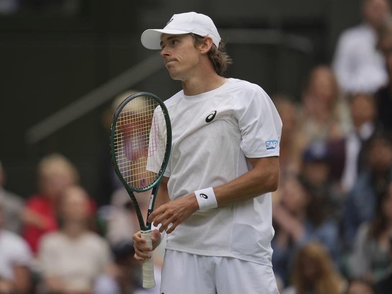 Alex de Minaur bowed out of Wimbledon after giving Novak Djokovic a tough four-set test. (AP PHOTO)