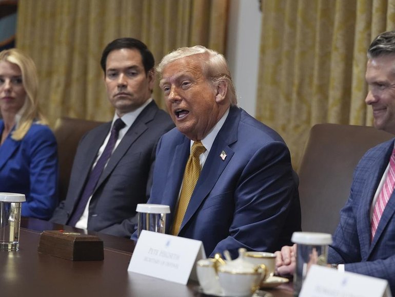 President Donald Trump directed his ire at Russian President Vladimir Putin at a cabinet meeting. (AP PHOTO)