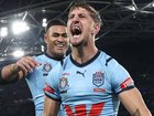 Zac Lomax of the Blues celebrates scoring a try - and perhaps also his impressive property portfolio - during game one of the 2024 Men's State of Origin series. Matt King/Getty Images