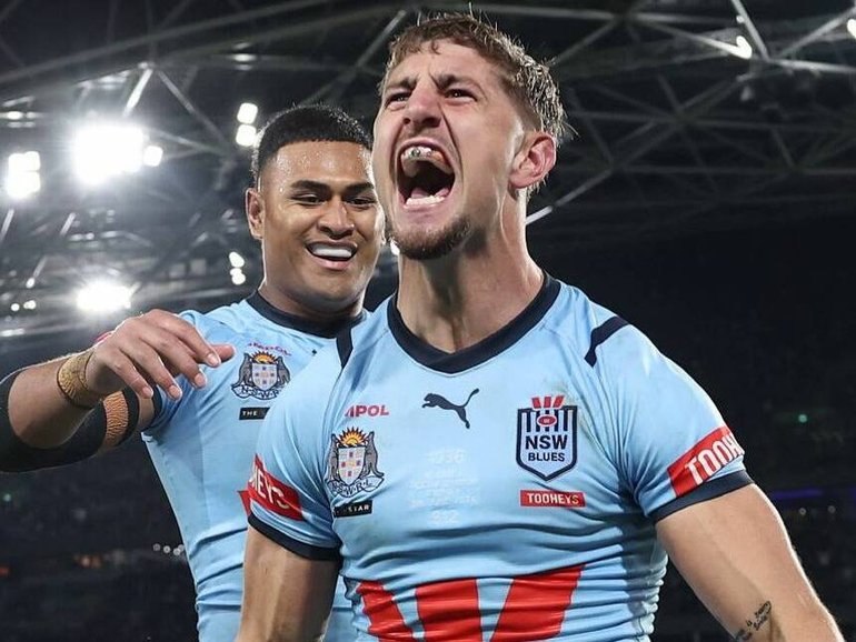 Zac Lomax of the Blues celebrates scoring a try - and perhaps also his impressive property portfolio - during game one of the 2024 Men's State of Origin series. Matt King/Getty Images