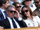 Hugh Grant and his wife Anna Elisabet Eberstein in the Royal Box before the actor was seen falling asleep on centre court.