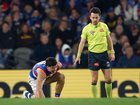 The umpire stops play as James O'Donnell of the Bulldogs recovers.