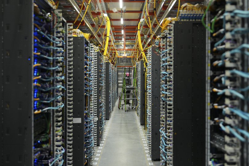 Racks of servers being tested at the new Amazon Web Services facility.