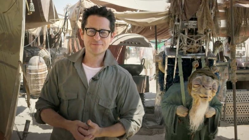 In this video grab made available by Lucasfilm Ltd. & TM on Thursday, May 22,  2014, J.J. Abrams, director of "Star Wars: Episode VII," talks to the fans from the movie set in the desert in Abu Dhabi, United Arab Emirates. Walt Disney Pictures announced Thursday, Nov. 6, that the movie previously known only as “Episode VII” has been dubbed “The Force Awakens.” Disney also said that principle photography has wrapped on the J.J. Abrams-directed sequel six months after beginning. The film will be released in December 2015. (AP Photo/Lucasfilm Ltd., File)