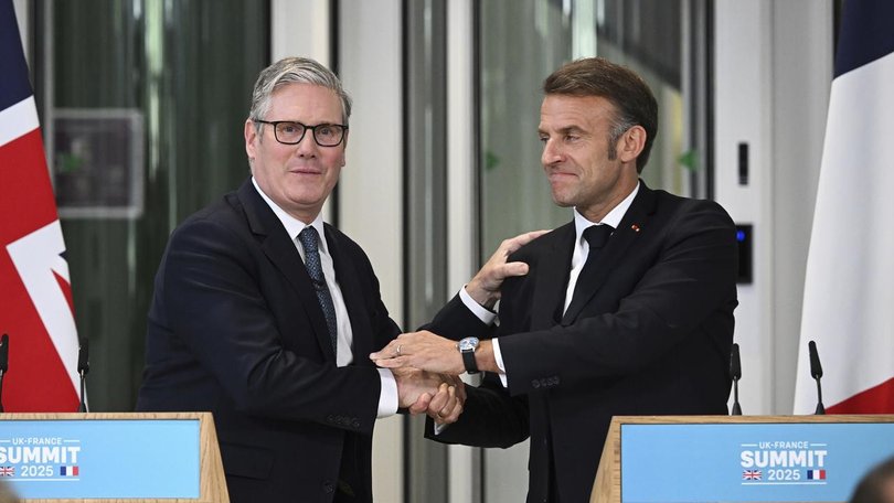 UK Prime Minister Keir Starmer and French President Emmanuel Macron backed a migrant return deal. (AP PHOTO)
