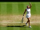 Amanda Anisimova of United States celebrates against Aryna Sabalenka.