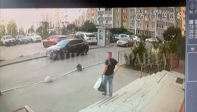 A CCTV footage shows a Security Service of Ukraine (SBU) officer walking down the stairs moments before he was shot in Kyiv.