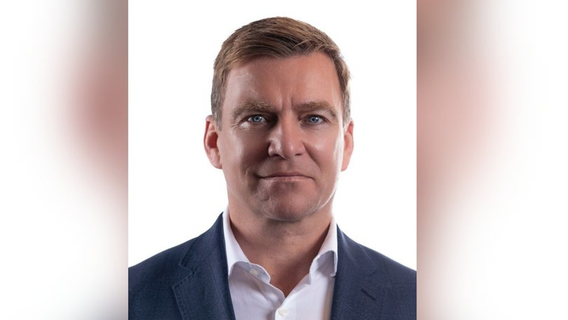 Commonwealth Bank executive Christopher James McCann has been extradited to Queensland, accused of arranging for a girl under 16 to attend a Brisbane hotel for sex.