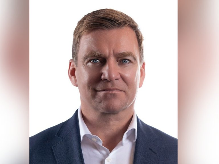 Commonwealth Bank executive Christopher James McCann has been extradited to Queensland, accused of arranging for a girl under 16 to attend a Brisbane hotel for sex.