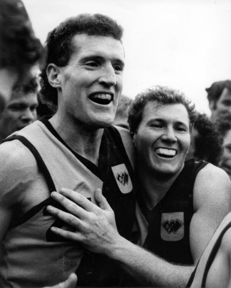 Football State of Origin WA v VIC 1986 - The happy faces tell the story. WA centre half back Ross Glendinning and half forward flanker Gary Buckenara savour the moment of victory. (WA winners by 3 points). 