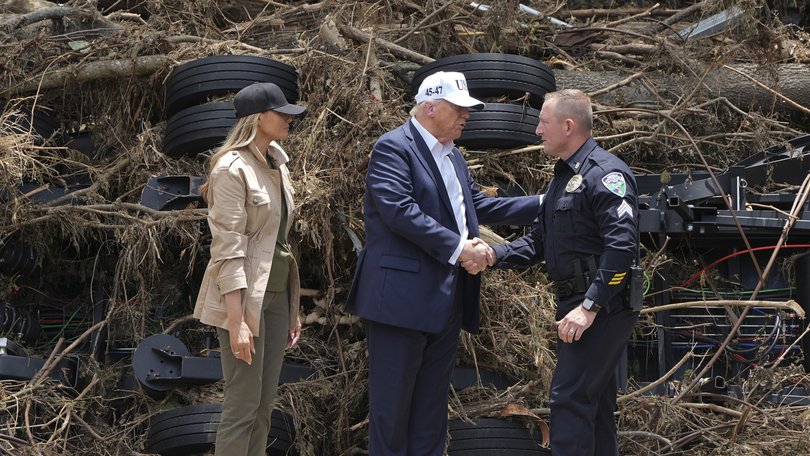 President Donald Trump and first lady Melania Trump greet first responders in Kerrville.