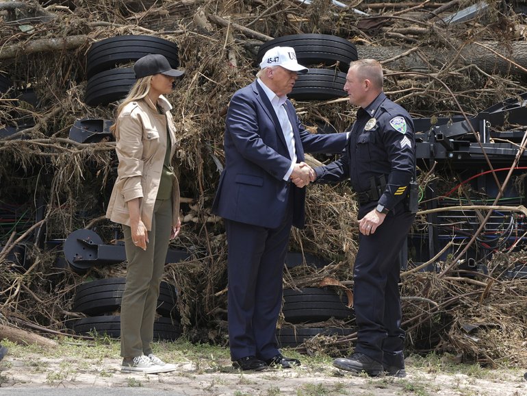 President Donald Trump and first lady Melania Trump greet first responders in Kerrville.