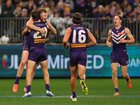 Josh Treacy of the Dockers celebrates a goal.