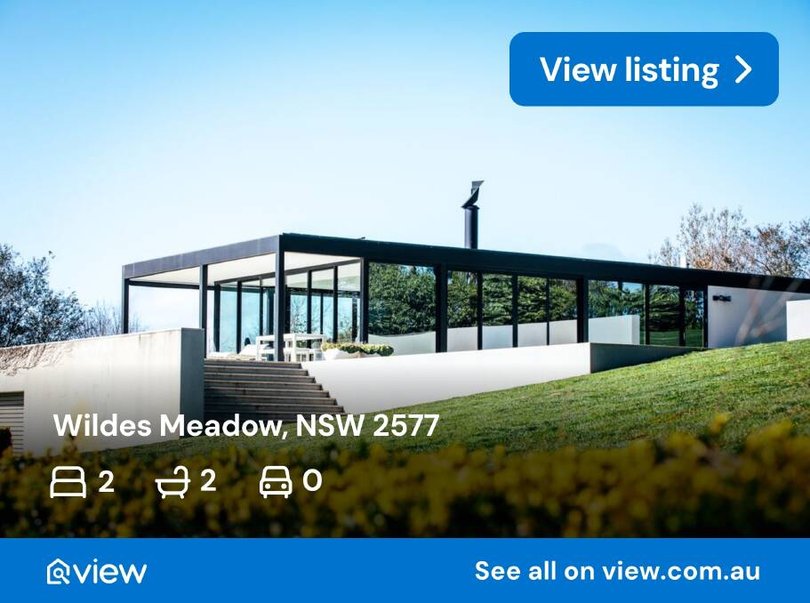 The glass pavilion takes in the surrounding views.