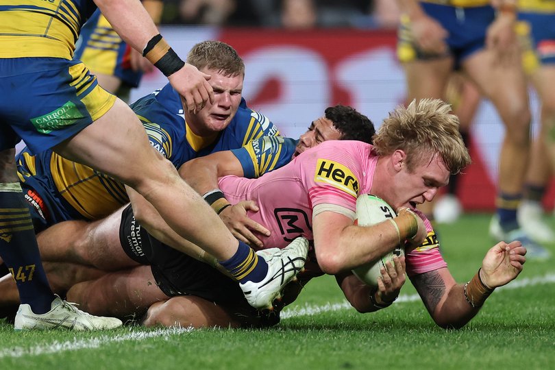 Penrith’s Lindsay Smith scores against Parramatta.