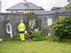 Handout photo issued by The Office of the Director of Authorised Intervention of a worker at the site of the former Mother and Baby institution in Tuam near Galway,