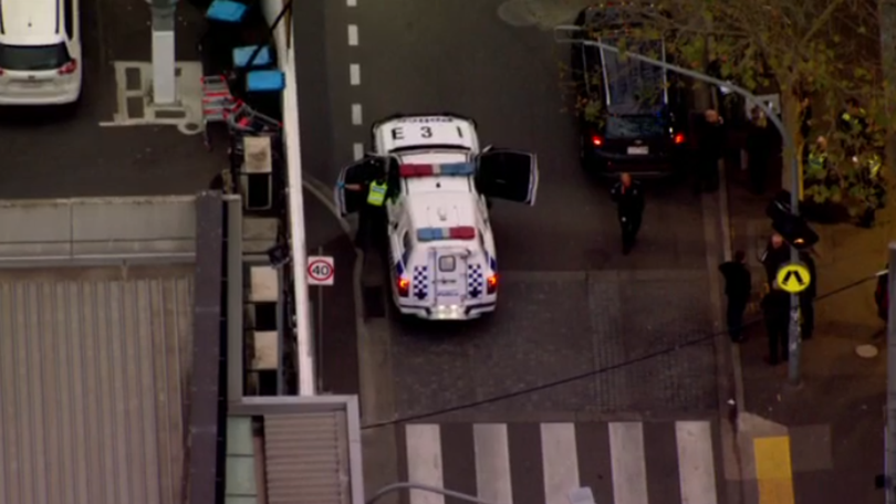 Police were seen at the scene of a stabbing outside Moonee Ponds Central.