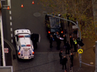 A man has been injured in a stabbing outside a shopping centre.