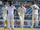 Australia's Mitchell Starc celebrates taking the wicket of West Indies' Jayden Seales.