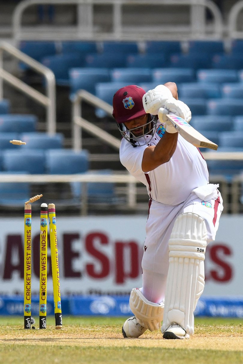 Brandon King of West Indies is bowled by unseen Mitchell Starc of Australia.