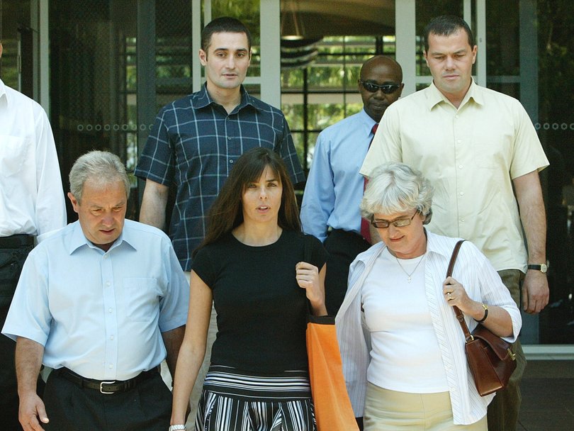 Joanne Lees, center, with the Falconio family Luciano, left, Joan, right, Paul, back left, and Nick, back right, as they leave the Northern Territory Supreme Court in 2005.
