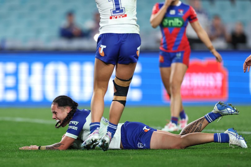 Angelina Teakaraanga-Katoa celebrates her try during the round one NRLW match between Canterbury Bulldogs and Newcastle Knights.