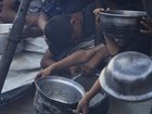 Twenty Palestinians died in a crush while struggling to get food at a community kitchen in Gaza