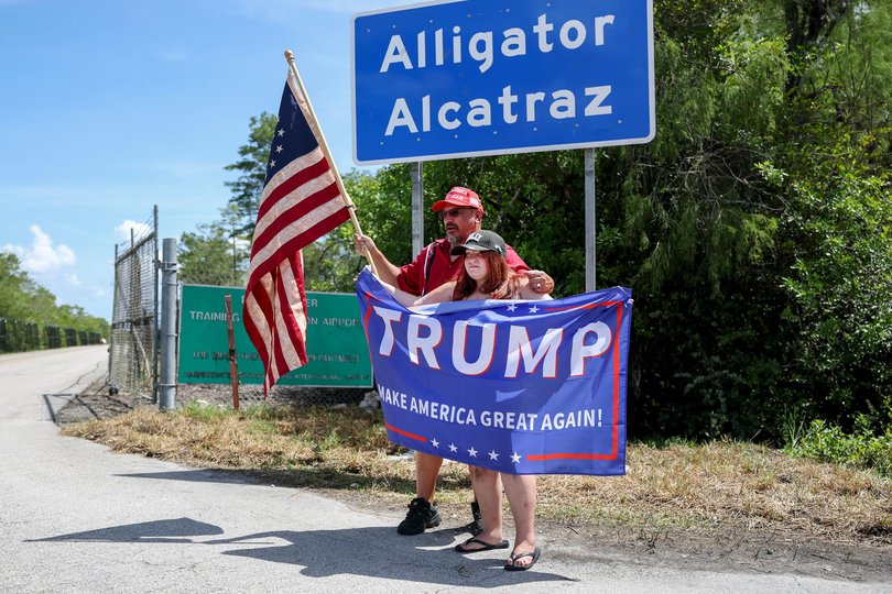 David Mourer and his niece Rena Mourer visit the entrance to Alligator Alcatraz in Ochopee, Florida.