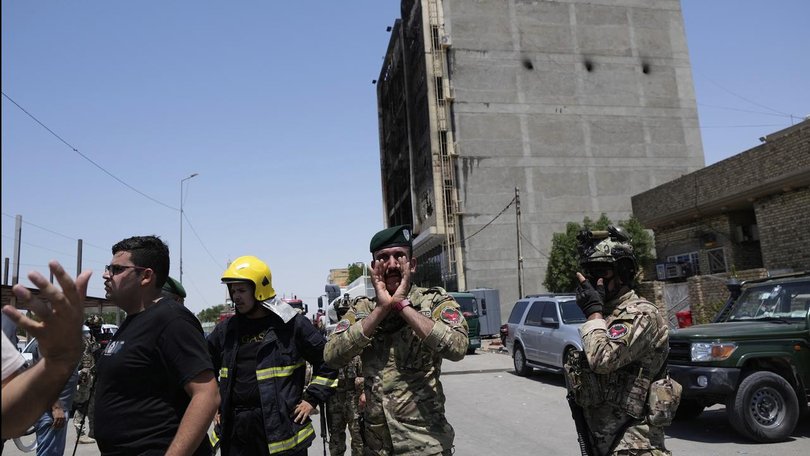 A fire at a newly opened shopping centre in eastern Iraq has killed more than 60 people, including women and children, Iraqi officials say.