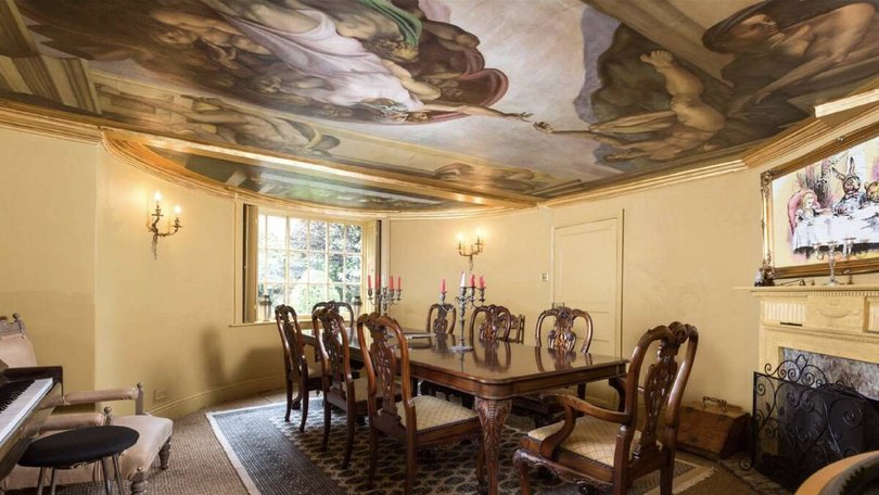 The ceiling in the upper hall depicting a grand Judgement of Paris scene.