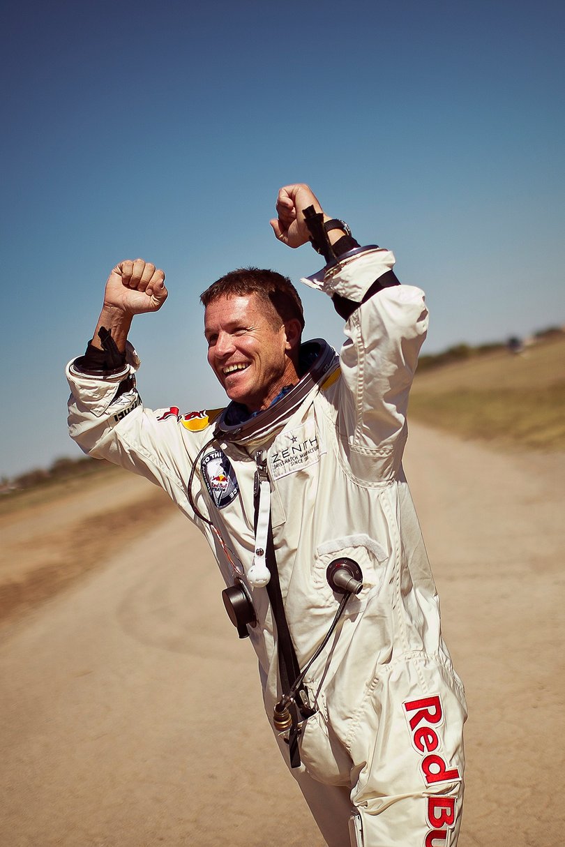 Pilot Felix Baumgartner of Austria celebrates after successfully completing the final manned flight for the Red Bull Stratos mission in Roswell, New Mexico, USA on October 14, 2012 Picture: Balazsgardi.com