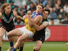 ADELAIDE, AUSTRALIA - JULY 13: Harley Reid of the Eagles is tackled by Zak Butters of the Power during the 2025 AFL Round 18 match between the Port Adelaide Power and the West Coast Eagles at Adelaide Oval on July 13, 2025 in Adelaide, Australia. (Photo by James Elsby/AFL Photos)