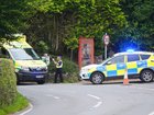 Emergency services near the scene of a fatal bus that killed a child. 