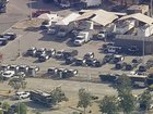 Police and emergency vehicles are in place at the scene of a blast at the Biscailuz Center Training Academy in East Los Angeles.