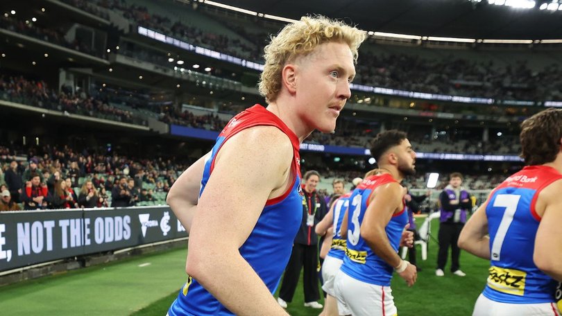 Clayton Oliver runs out ahead of his milestone game. 