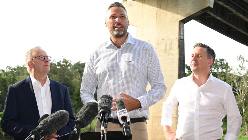 Anthony Albanese and Mark Butler listen to Labor candidate for Leichhardt Matt Smith during the 2025 election campaign.