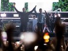 Liam and Noel Gallagher have opened their reunion tour with a concert in Cardiff, Wales. (AP PHOTO)