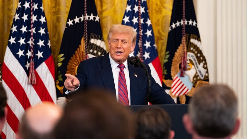 President Donald Trump speaks before the signing of the Genius Act at the White House on July 18.