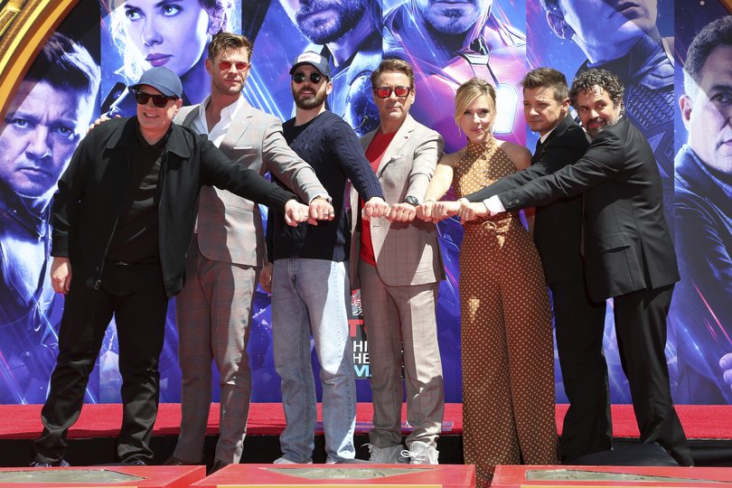 Kevin Feige, left, with Chris Hemsworth, Chris Evans, Robert Downey Jr, Scarlett Johansson, Jeremy Renner and Mark Ruffalo at the Avengers: Endgame premiere. 