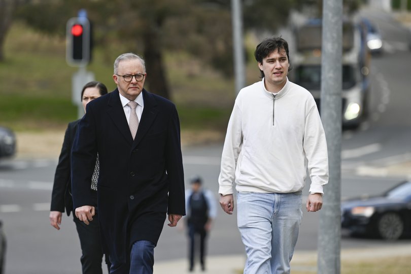 Prime Minister Anthony Albanese and his son Nathan arrive at Parliament House in Canberra.