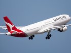 A Qantas pilot passed out in the cabin while at the controls of a passenger jet.