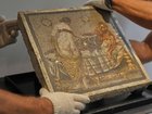 An ancient Roman mosaic depicting a half naked couple has returned to Pompeii more than 80 years.