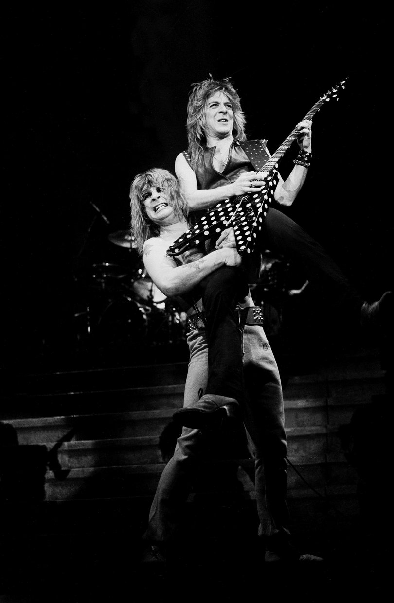 Osbourne and American musician Randy Rhodes (1956 perform onstage in January 24, 1982.